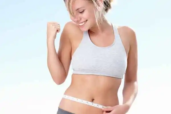 woman happy after fat reduction treatment Byfleet
