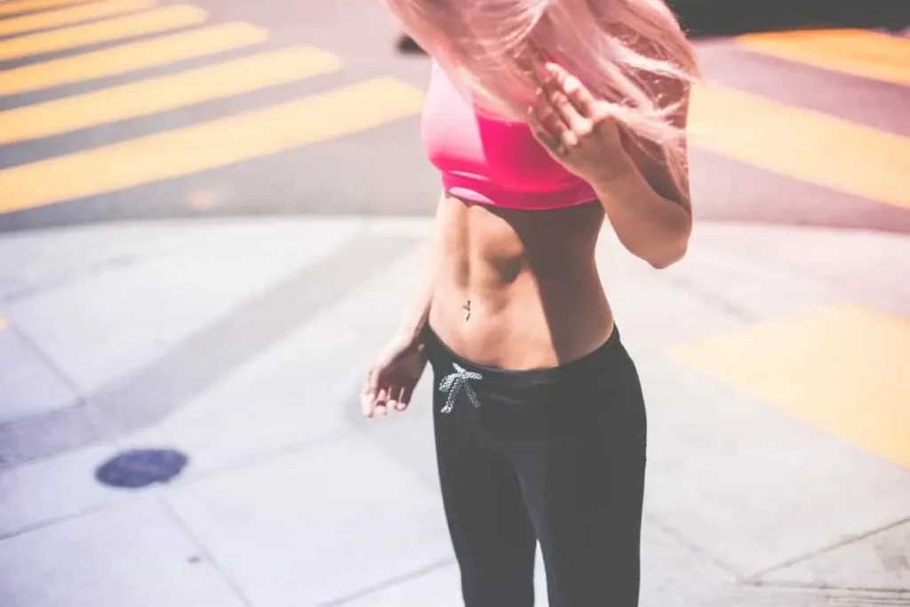 Woman with toned stomach after LA-EMS Body Sculpting Treatment Byfleet